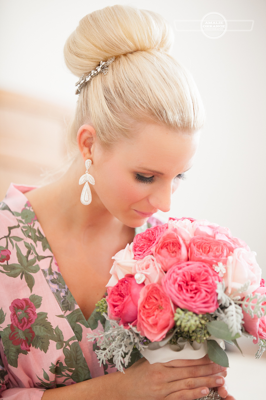 bride smelling bouquet