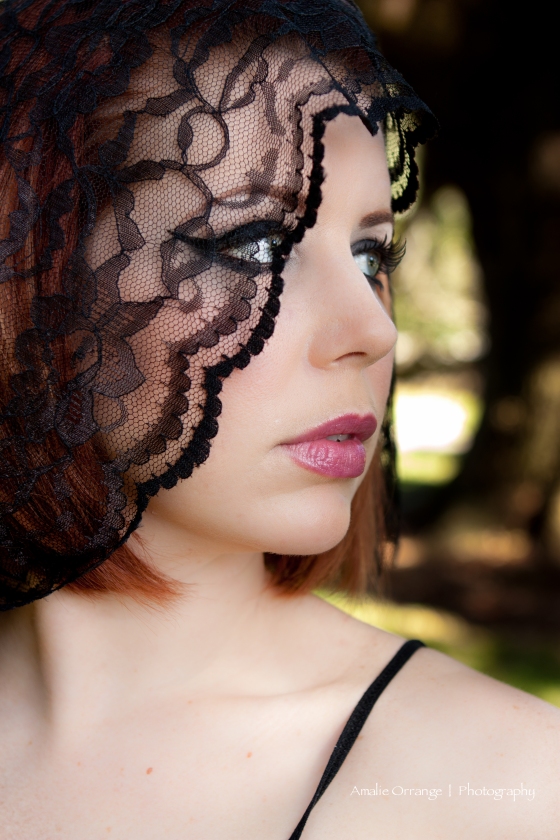 model with a black lace veil 