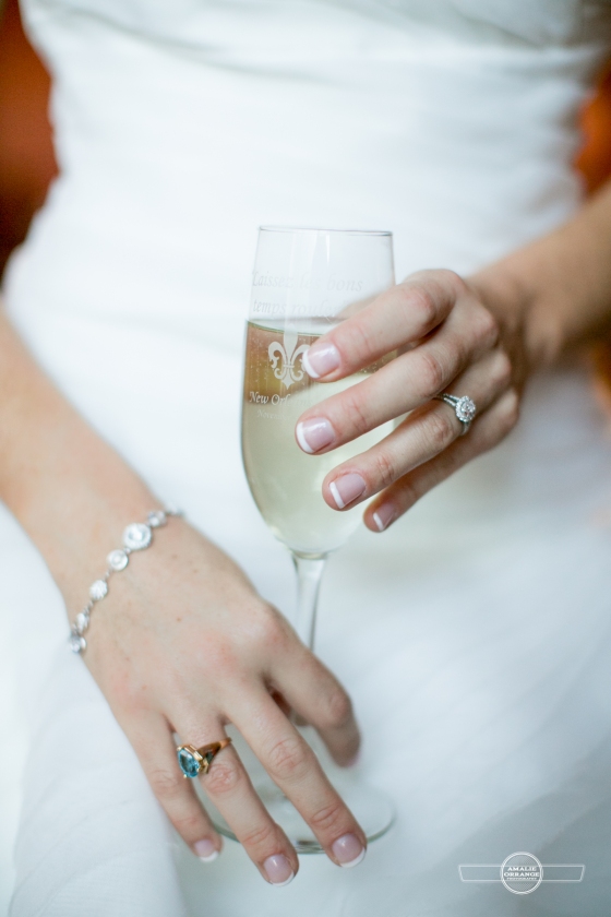 bride holding champagne glass